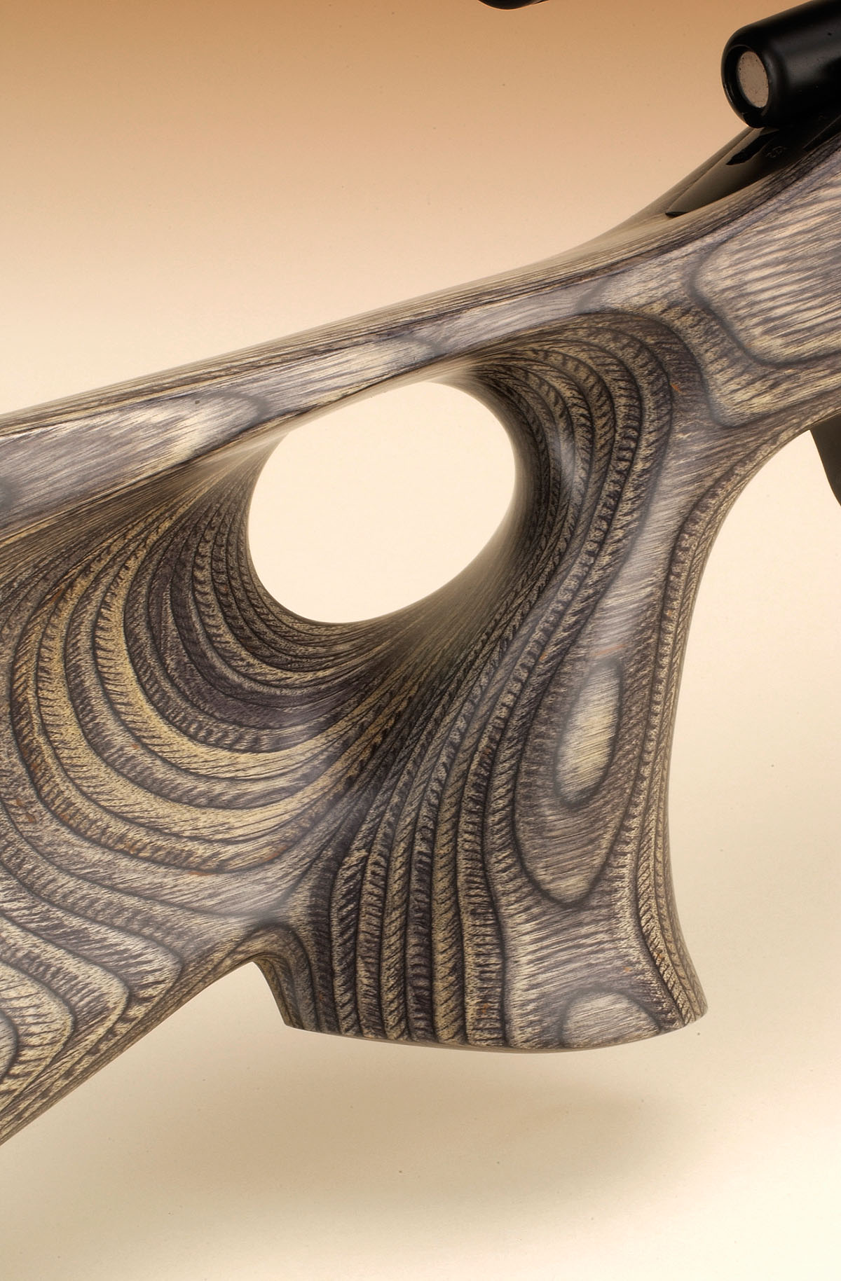 For shooting at the bench or in the field, the thumbhole stock with its flared grip is comfortable for long  sessions, even in a prone position.