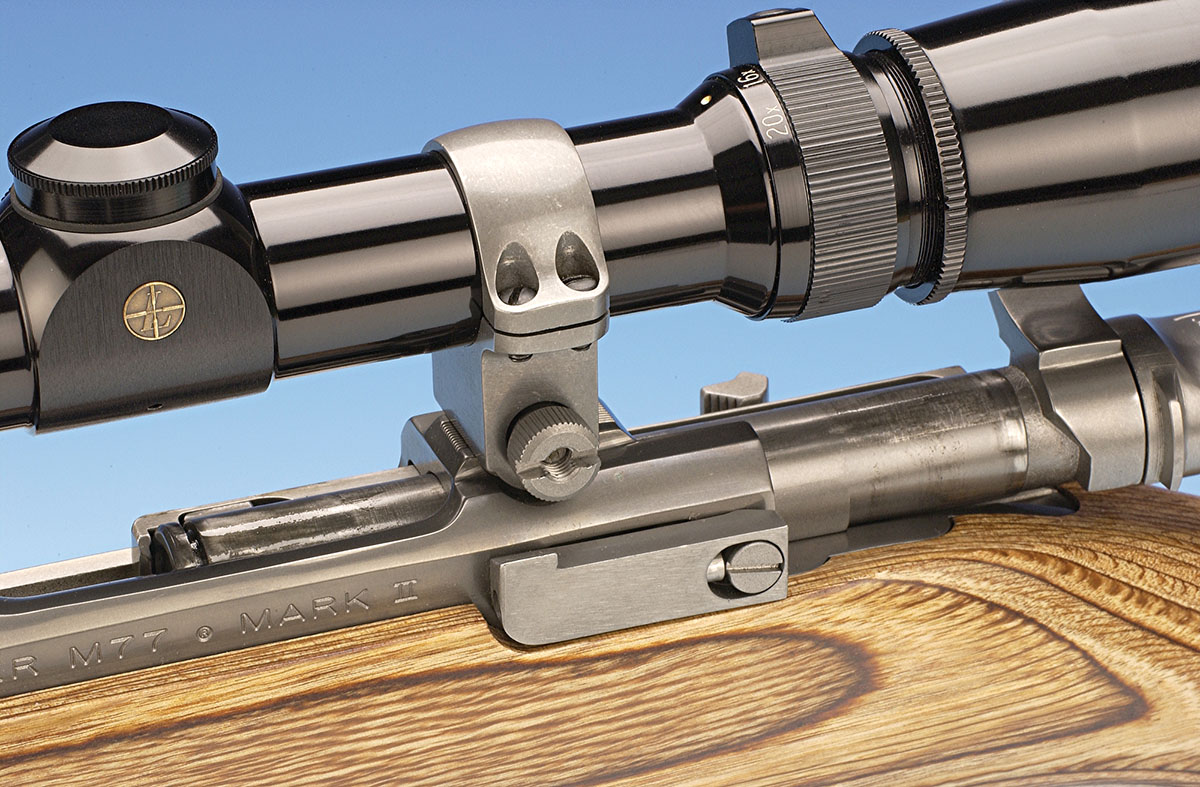 The scope ring attachment screws and the bolt release are on the left side of the receiver.