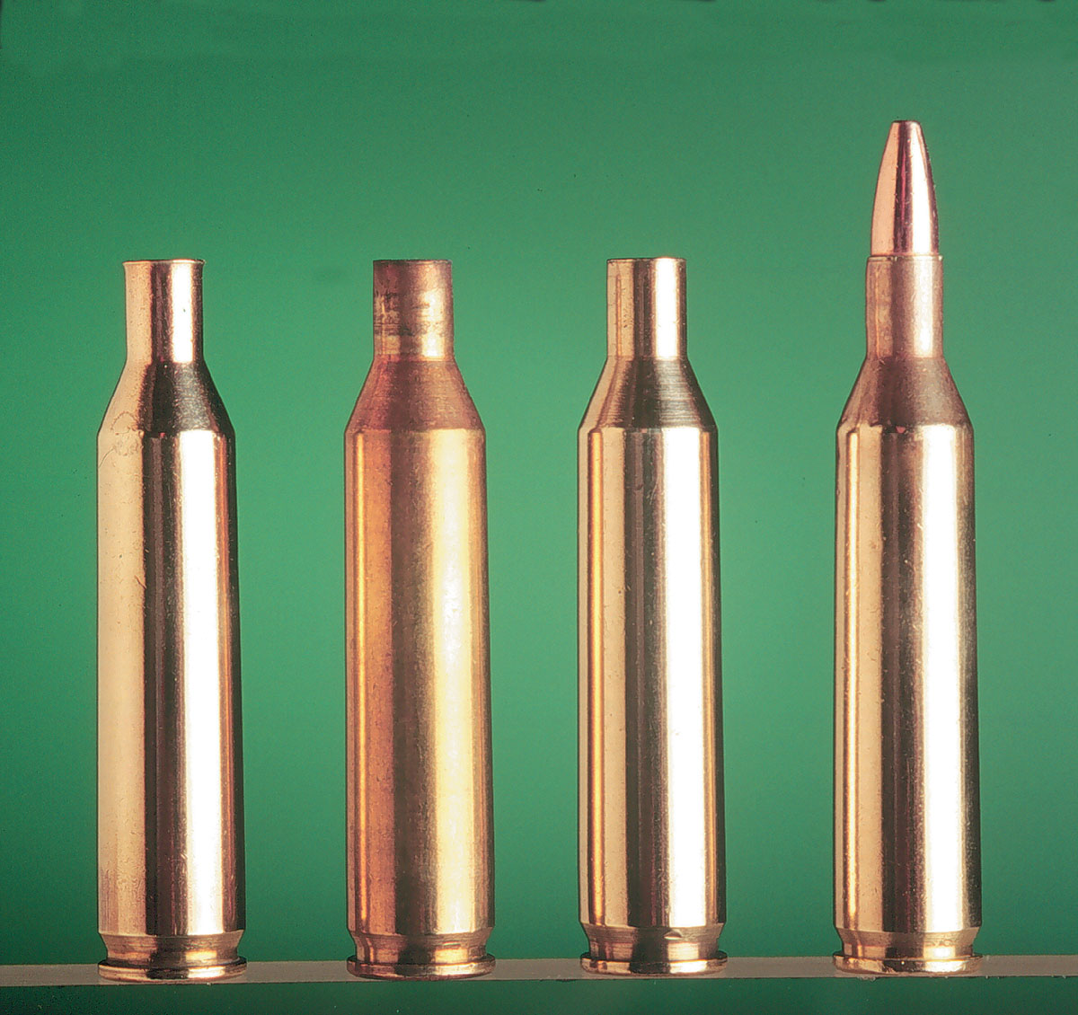The .17 Remington factory case on the left is followed by a fired case and a neck-sized case. The factory round on the far right is shown for comparison.