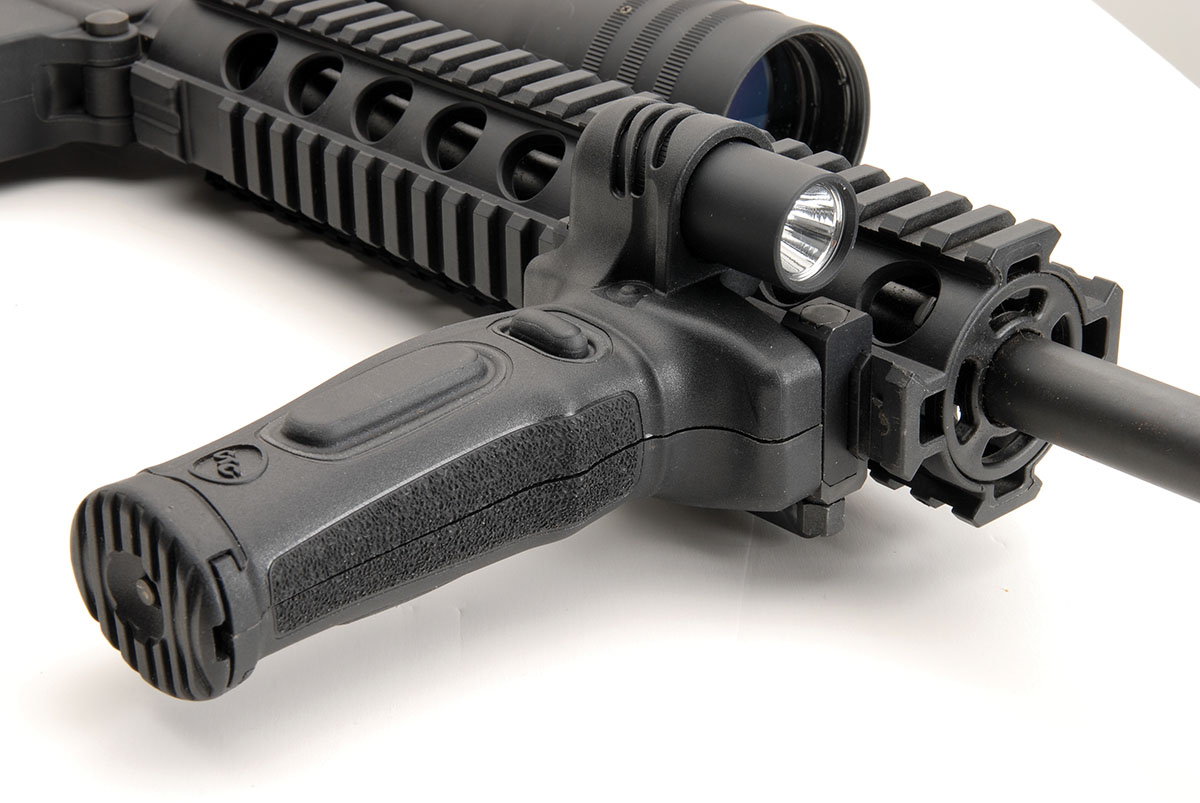 A Crimson Trace MVF-15 combination light/laser foregrip was used for indoor, low-light shooting.