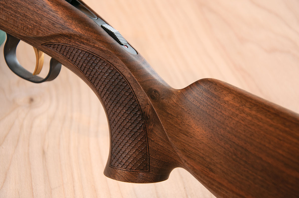 The Steyr features a tang-mounted, two-position safety, and its stock design has pleasing lines and a Bavarian cheekpiece.