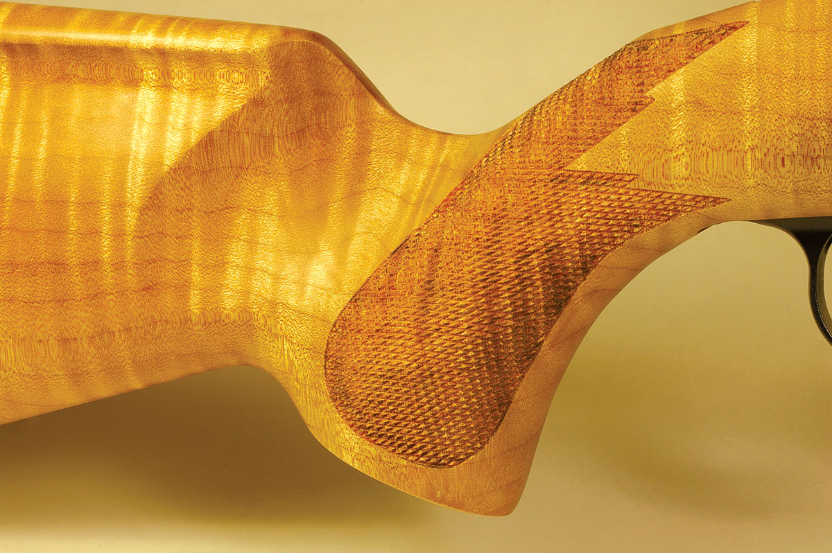 The deep flute on the stock of the Cooper Custom Model 54 is a great aid in handling the rifle.