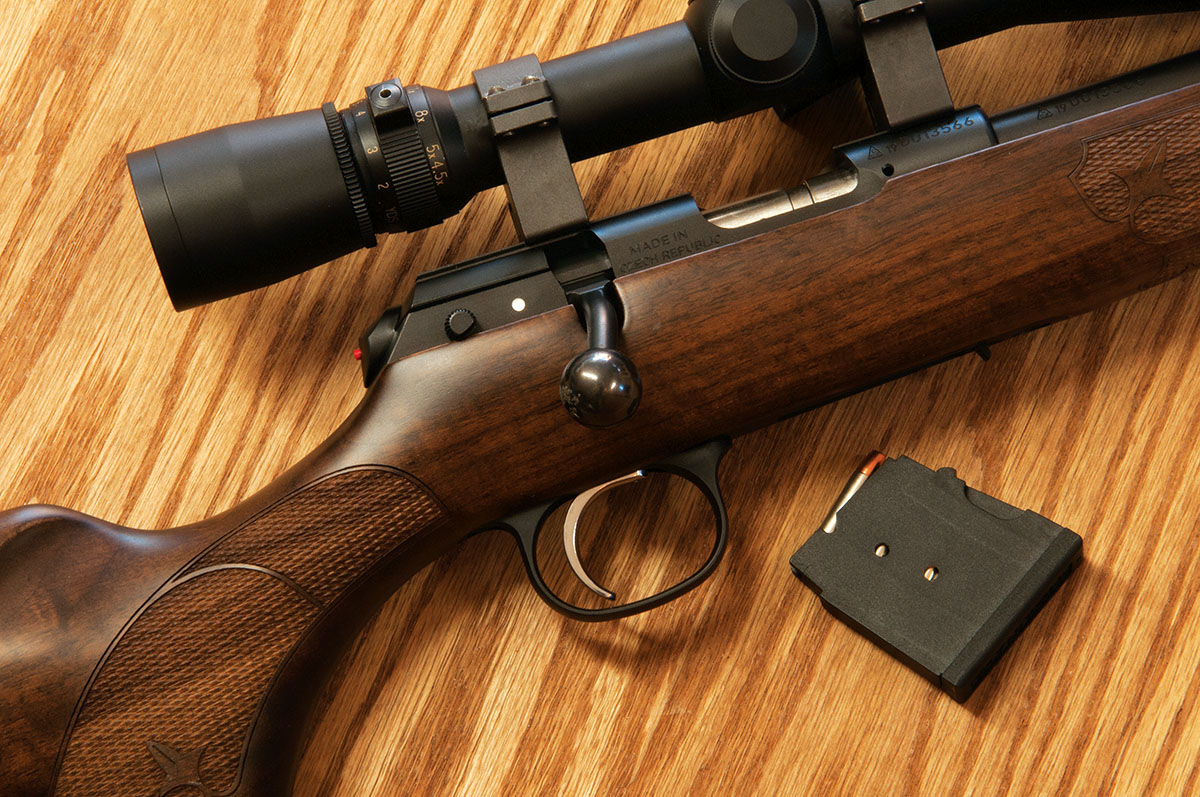 Magazine capacity is five rounds of .22 Magnum. Note the traditional 11mm dovetail scope rail atop the receiver and two-position safety.