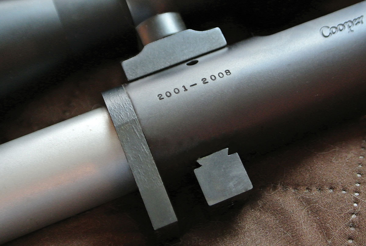 The custom Model 22 features an unusual dual recoil lug setup. The front lug is from a Cooper Model 52. The smaller, square recoil lug is standard design for this model.