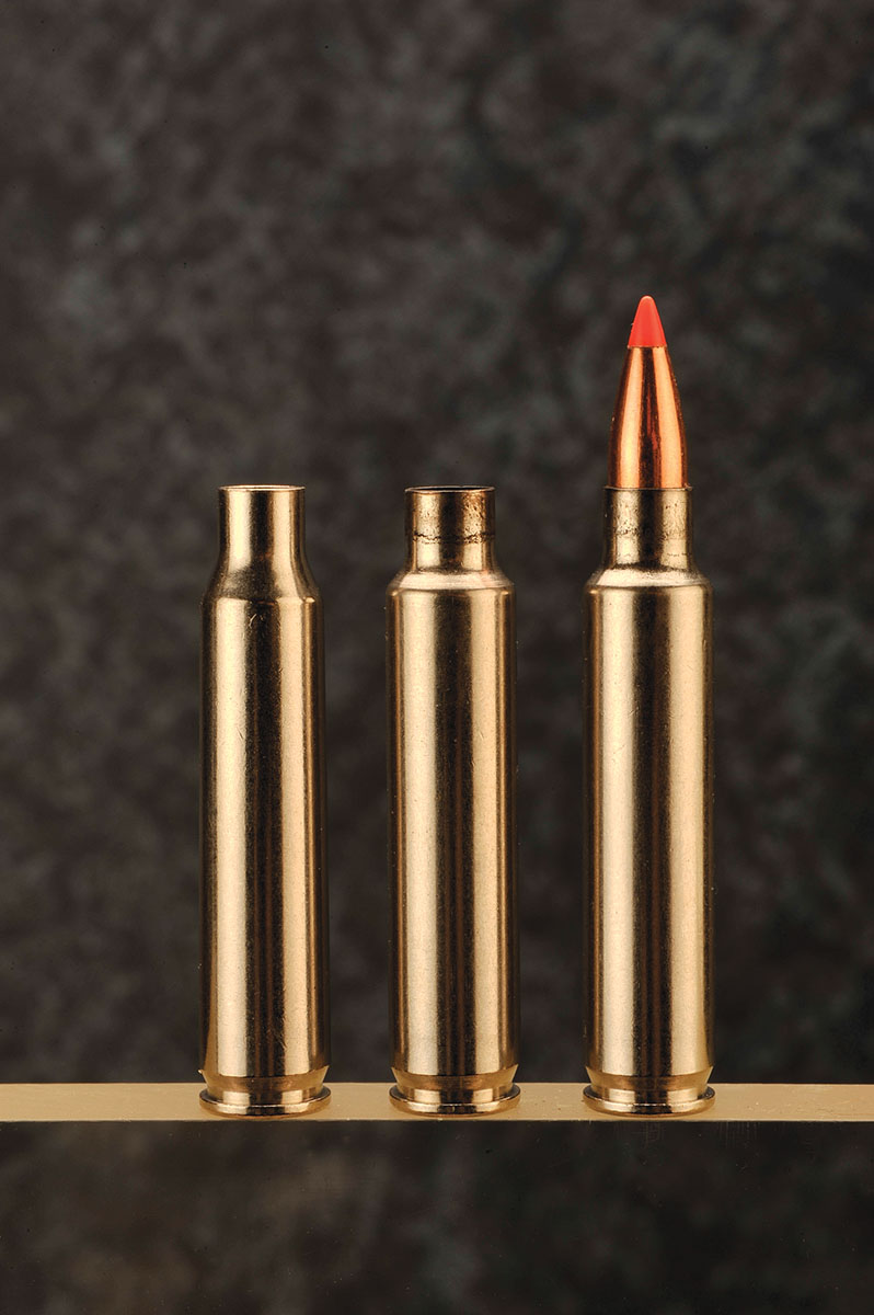 At left is a standard .223 Remington case followed by a .223 AI fireformed, neck-sized case and a loaded .223 Remington AI round.