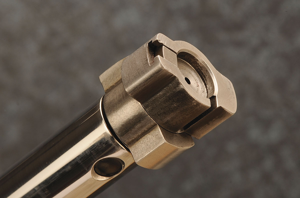 Shaw kept the traditional Savage bolt-head system with a unique gas baffle behind the locking lugs. Note the massive extractor.