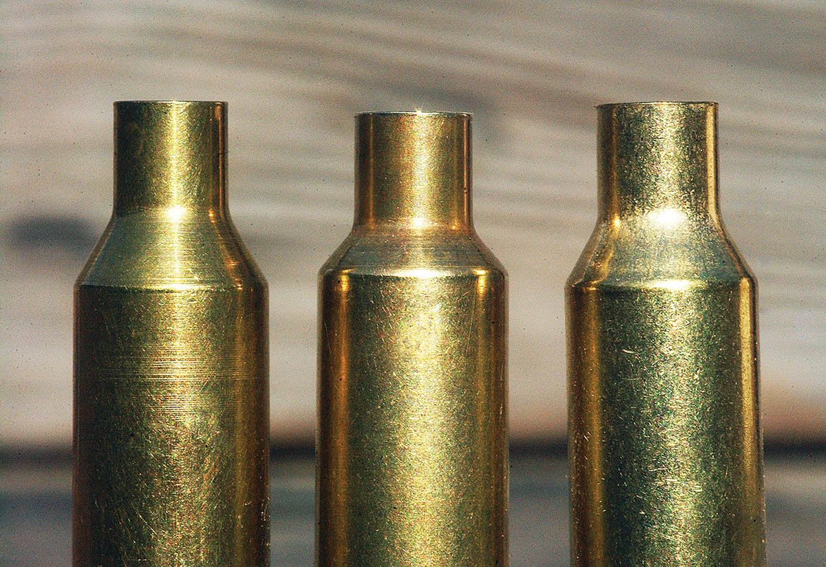 The 250 Ackley Improved is sandwiched between its modern siblings, the 6mm Creedmoor at left and the 6.5mm Creedmoor at right. Note the case is slightly less tapered on the older 250 AI round and has a slightly shorter neck.