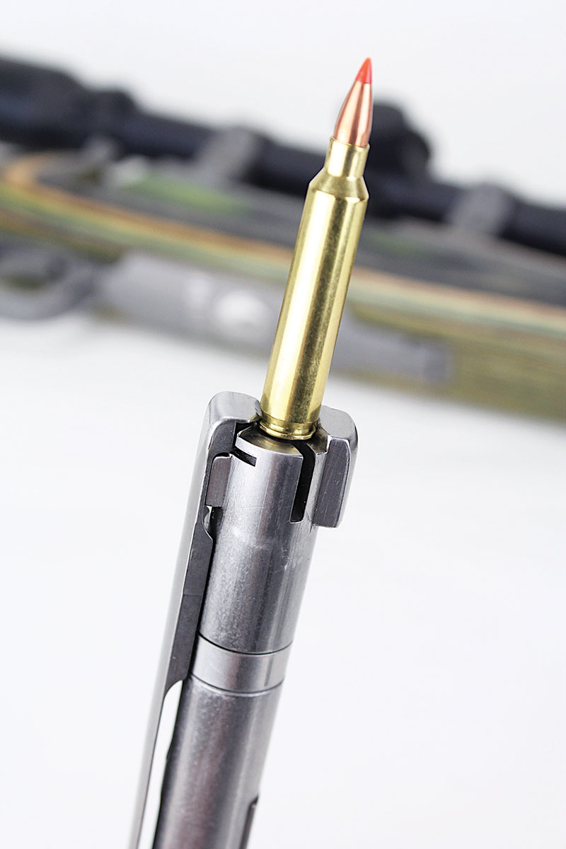 The Ruger’s left bolt lug serves double duty as a second extractor; the angled slot below accommodates passage of the blade ejector.