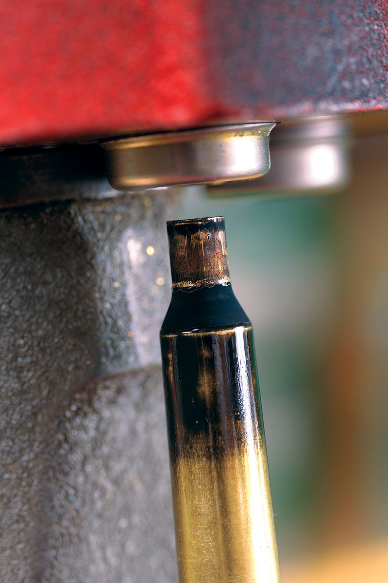 When you have the once-fired brass, the next step is to neck size only for the best accuracy. Smoke or mark the case, moving it up in the die until it almost bumps the shoulder as shown here.
