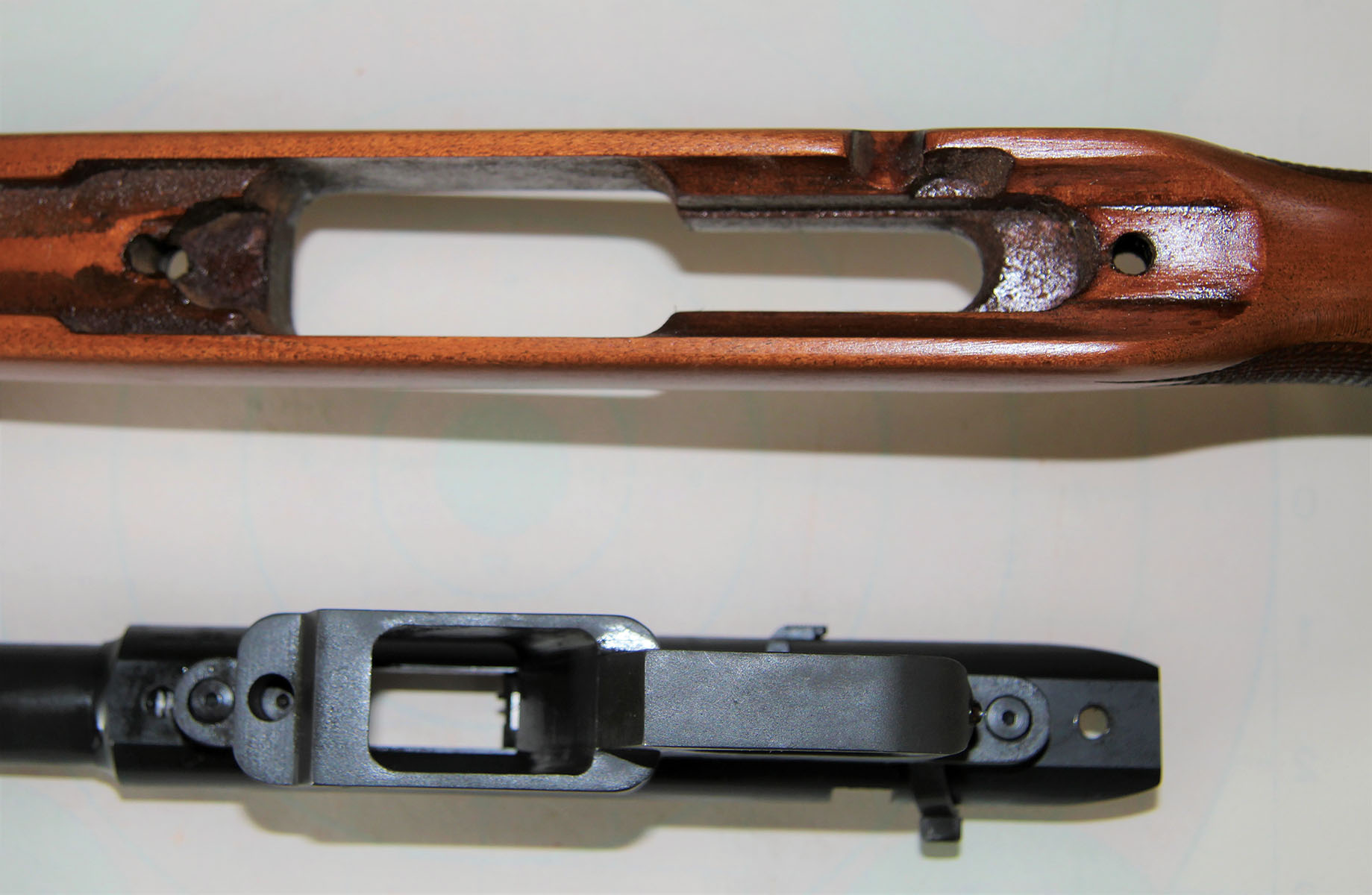 Rock Island Armory’s 22M TCM BA rifle does not have a recoil lug in the traditional sense, but a milled aluminum trigger guard/magazine well block that fits into a tight stock mortise.