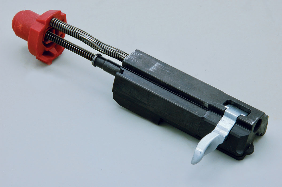The take-down button, recoil spring, striker and breechblock assembly.