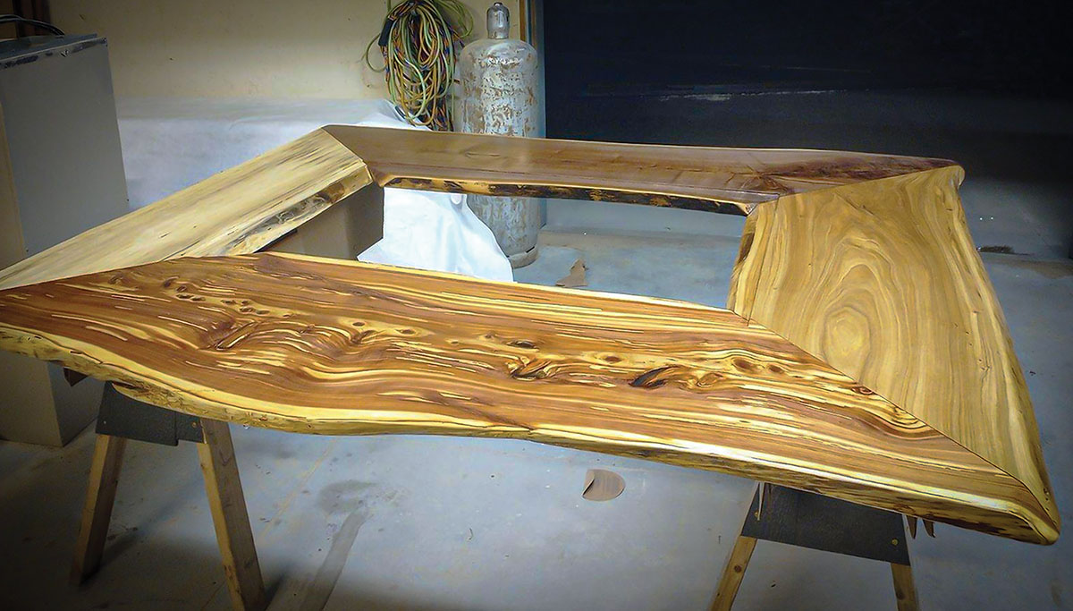 After: The assembled bar top after being sprayed. I jokingly say my construction skills are like Hamburger Helper. It just never turns out as good as the box. This top, however, exceeded all expectations.