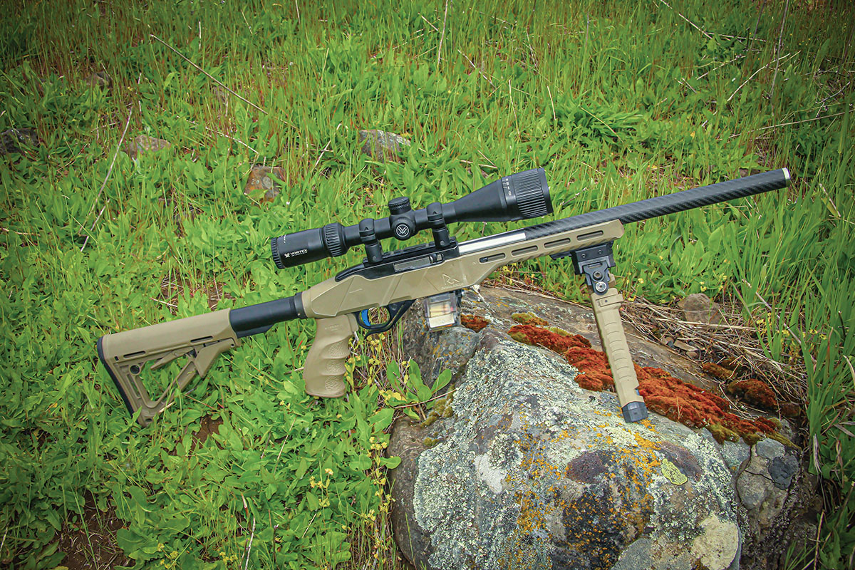 This is Patrick’s lightweight walkabout Ruger 10/22 build. Based on a Rival Arms R-22 chassis with F.A.B. Defense pistol grip and MagPul CTR Carbine Stock, Volquartsen carbon tension barrel, Timney Trigger group and clear-mag, 30-round, Tri-Mag system.