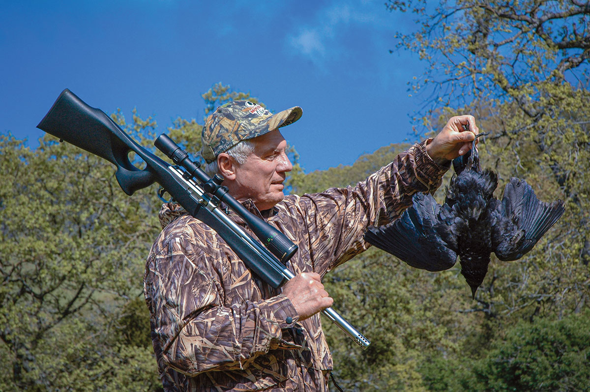 The all-encompassing varmint battery must have a rifle chambered for the 17 HMR, and this Volquartsen Deluxe is a top-tier choice.