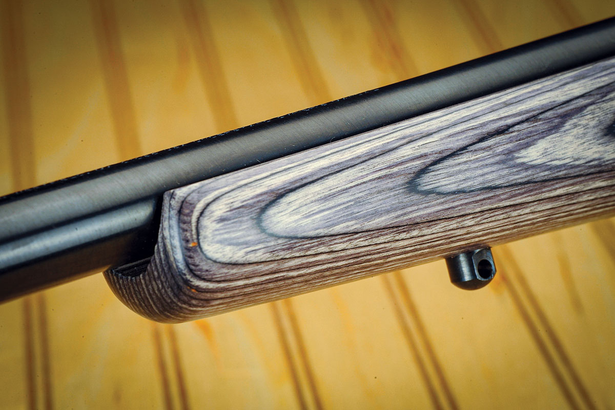 Like a typical hunting rifle, the barrel is free-floated right up to the receiver. The finish is deep blue. Sling swivel studs, both front and rear, come with  the gun.