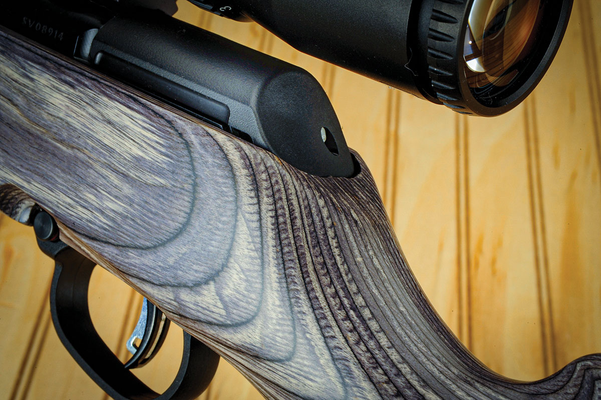 The details on the gun are evident here. Take note of the close inletting around the bolt shroud and the fine fit and finish. The hole at the rear of the shroud is to part it from the action for  maintenance of the bolt.